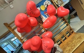 czerwone balony w kształcie serc z napisem I love MP 12